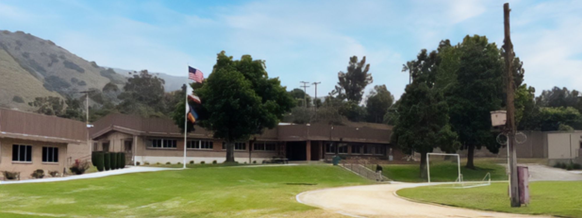 Picture of buildings with foothill at the background